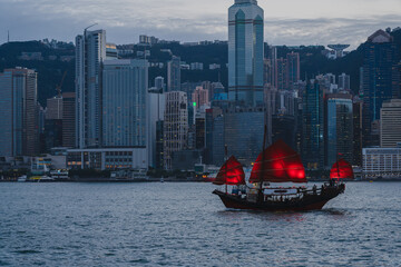 Wall Mural - Hong Kong City skyline with junk boat