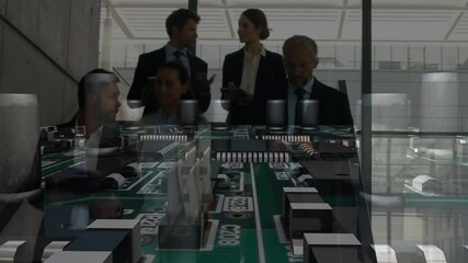 Poster - Animation of computer circuit board over business people talking in modern office