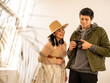 © Josue Rivas - Young Indigenous model and photographer doing a photo session indoors