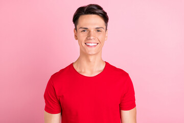 Canvas Print - Photo of funny charming young man wear red t-shirt smiling isolated pink color background