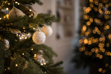 Decorative Christmas White Balls On A Tree With Bokeh In The Background, Shallow Depth Of Field, New Year Decor, Merry Christmas