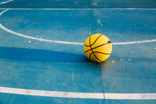 Basketball Ball On Sports Ground In Park In Daytime