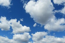 Beautiful Heart Shape Clouds In The Blue Sky Background