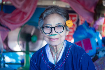 elderly patients wear oxygen tubes through their noses to help them breathe. concept of disease in t