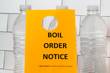 Boil Order Notice And Bottled Water. Clean, Contaminated, Dirty Or Broken Drinking Water Supply Concept.