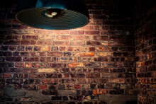 Illuminated Grunge Red Brick Wall Background