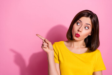 Sticker - Photo of charming funny young woman wear yellow outfit lips pouted pointing empty space isolated pink color background