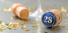 Champagne Cap With The Number 28