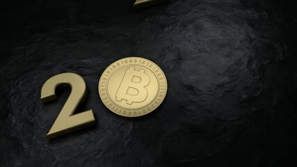 Wall Mural - 3d animation of a falling gold coin. Golden bitcoin, a cryptocurrency, falls to the black surface and the date of the new year 2022 appears. The future of cryptocurrency.