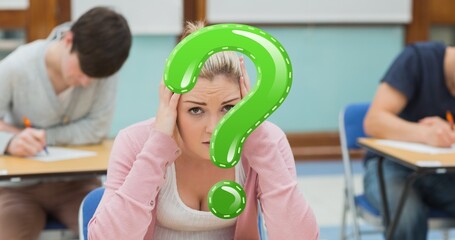 Poster - Digital composite of green question mark over tensed female student sitting in exam hall