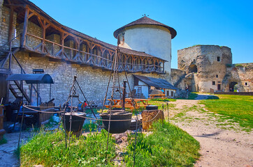 Wall Mural - Kamianets-Podilskyi Castle courtyard with medieval kitchen, Ukraine