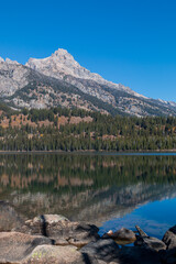 Wall Mural - Scenic Reflection Landscape of the Tetons in Taggart Lake Wyoming in Autumn