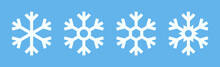 White Snowflakes Icons Set Vector. Isolated White Winter Snowflake Symbols On Blue Background. Silhouette Christmas Snow-flake Sign. Vector Illustration.