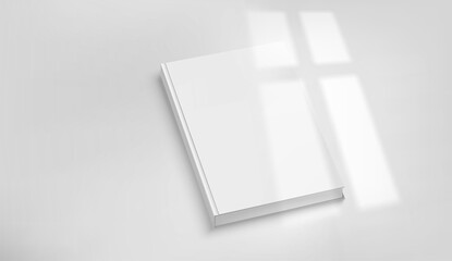 Poster - White book on a tabke with light of the window shadow overlay. Realistic vector mockup