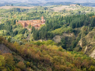 Sticker - Italy, Tuscany. The abbey of Monte Oliveto Maggiore, a large Benedictine monastery located in Tuscany.