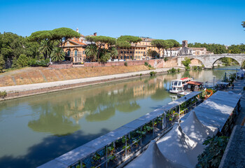 Wall Mural - Rome - The Isola Tiberiana - Tiberian Island with the Ponte Cestio bridge.