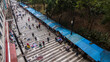 Sao Paulo, Brazil, November 20, 2021. people walk along the General Carneiro street in Sao Paulo, Brazil.	
