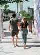 © Alberto GV PHOTOGRAP - couple walking on the street Miami Wynwood
