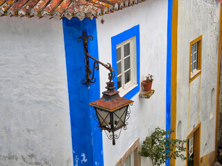 Poster - Portugal, Obidos. Graphic buildings inside the White walled town