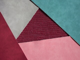 Wall Mural -  red, burgundy, blue, gray geometric shapes as background, knitting middle