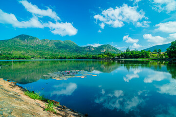 Clear view with An Hai Lake and mountain at Con Dao. Natural color Crystal Blue lake. 