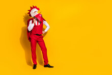 Photo Of Freak Guy Hold Jacket Chinese Event Concept Wear Rooster Mask Red Suit Isolated Yellow Color Background