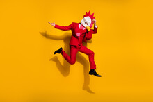 Photo Of Carefree Model Guy Absurd Jump Wear Cock Polygonal Mask Red Tux Shoes Isolated Yellow Color Background