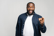 © Vadim Pastuh - We need you. Happy African guy choosing you, pointing index finger at the camera with happy excited face, giving job opportunity or deal