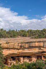 Poster - USA, Colorado. Mesa Verde National Park. Spruce Tree House Ruins, was constructed by Ancestral Puebloans between 1211 and 1278 CE. The dwelling contains about 130 rooms.