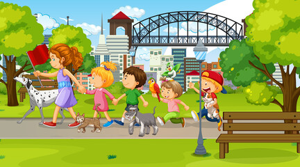 Wall Mural - Children walking with their animals at the park