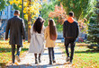 © Andrey_Arkusha - Back view, family walking in the autumn park