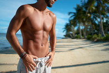 Strong And Handsome. Enjoying Suntan. Close Up Of Young Man On The Tropical Sand Beach.
