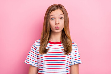 Poster - Photo of flirty teenager girl blow kiss wear red t-shirt isolated on pink color background