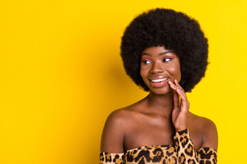 Canvas Print - Portrait of attractive cheerful girl looking aside thinking copy empty space isolated over bright yellow color background