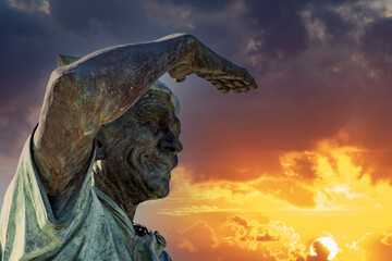 Wall Mural - Sailor statue looking at the horizon in la paz baja california waterfront promenade