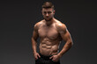 © speed300 - Portrait of man looking at camera with serious face. Young caucasian guy is half naked. Sport and bodybuilding concept