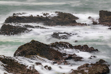 Canvas Print - Long exposure of wave action along coastline, Shore Acres State Park, Cape Arago Highway, Coos Bay, Oregon