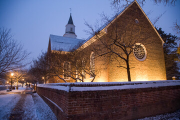 Old colonial church in winter with snow