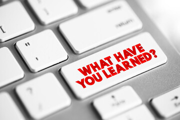 Wall Mural - what have you learned question text button on keyboard, concept background
