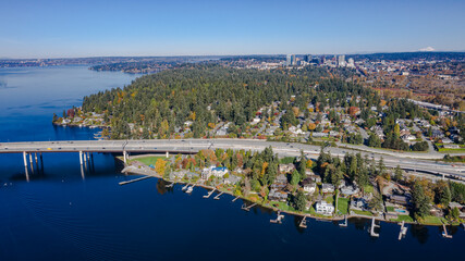 Wall Mural - USA, Washington State, Bellevue. Lake Washington and SR520 floating bridge in autumn, with downtown Bellevue in distance.