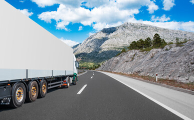 Wall Mural - White truck on the highway. White truck on asphalt road.