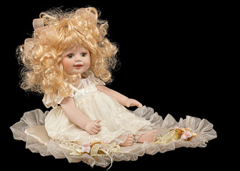 Wall Mural - Vintage porcelain doll, isolated on black background