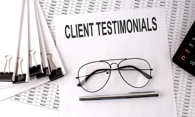 Poster - CLIENT TESTIMONIALS text on paper with chart and office tools , business concept