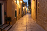 Fototapeta Uliczki - Street view with old buildings in Spain, Balear Islands
