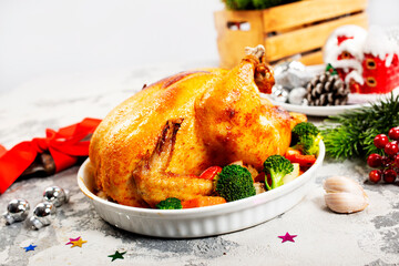 Poster - christmas chicken. baked chicken. chicken with spice on white plate