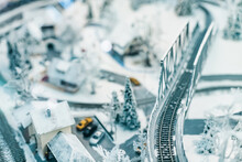 Miniature Model Of A City With Houses And A Railway Bridge. Narrow Focus Field