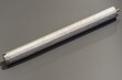 New Magnesium anode on grey background. Selective soft focus.