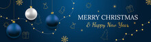 Merry Christmas And Happy New Year Vector Banner. Realistic Rose Gold And Blue Baubles, Snowflakes Hanging On Dark Blue Background With Realistic Garland. Background With Gold Christmas Icon