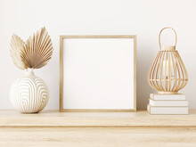 Square Wooden Frame Mockup In Warm Neutral Minimalist Japandi Interior With Dried Palm Leaves, Wicker Lantern And Books On Light Beige Shelf On Empty White Wall  Background. Illustration, 3d Rendering