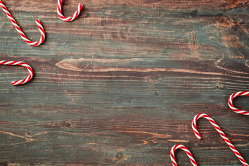 Poster - group of candy cane on rustic table top view background